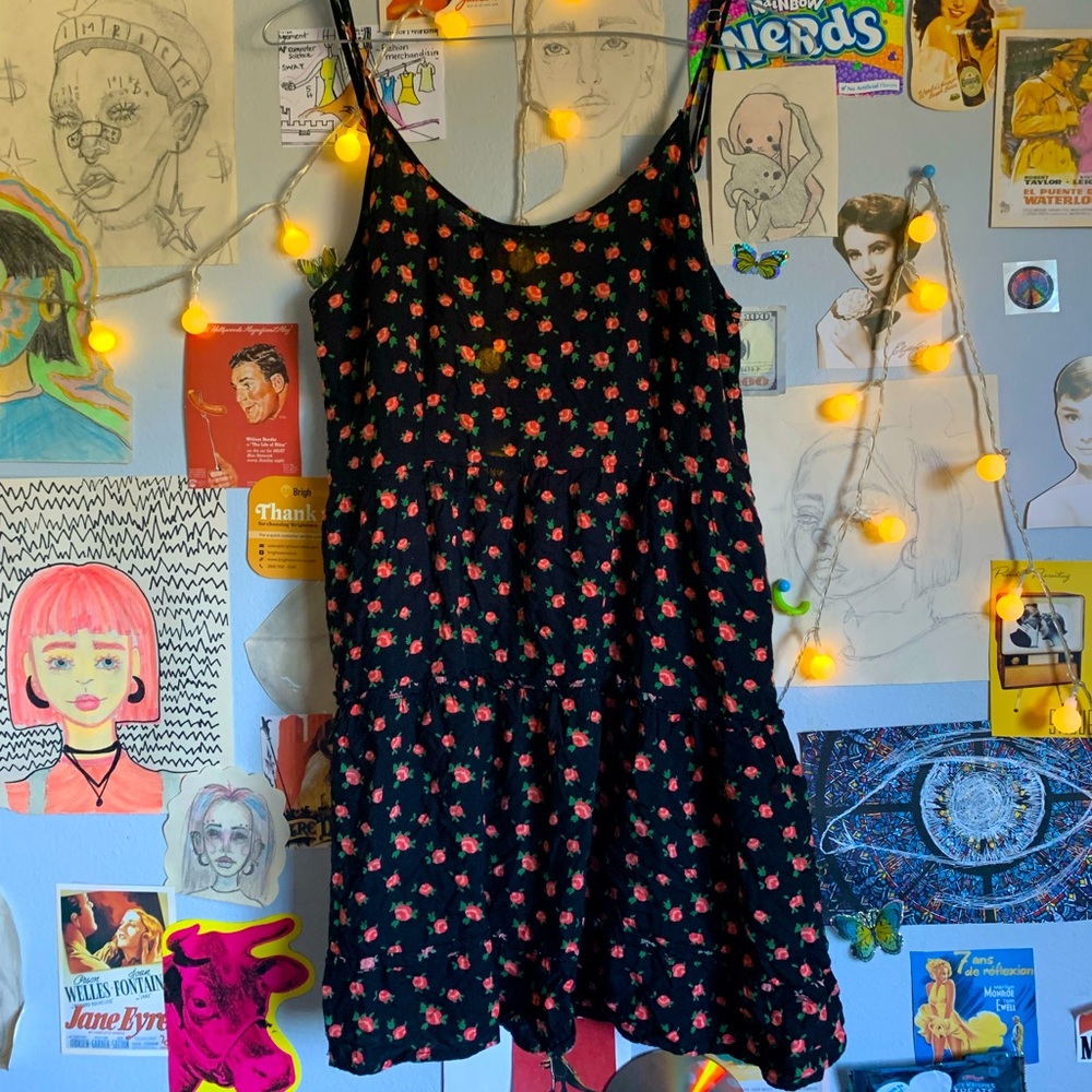 Very cute summer sundress, open back very flowy and comfy